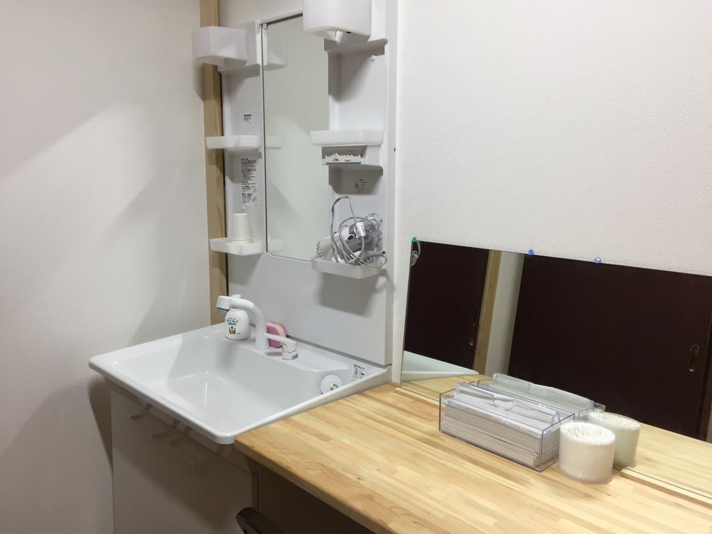 Hotel Simple Sleep 個室カプセル Hitoyoshi Esterno foto
