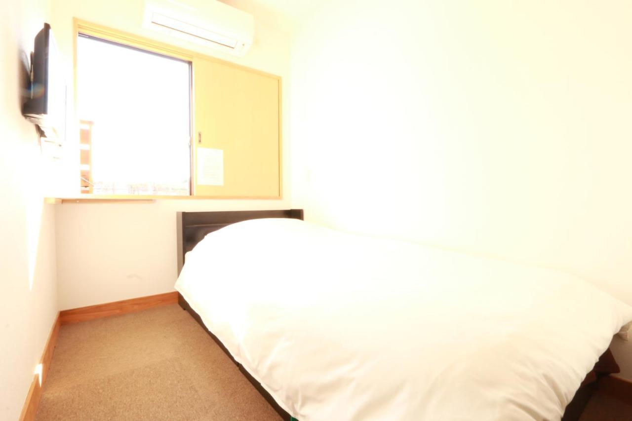 Hotel Simple Sleep 個室カプセル Hitoyoshi Esterno foto